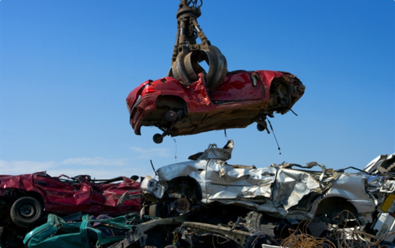 A car being scrapped in a scrap car facility