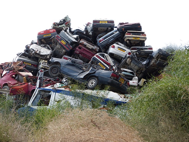 Several scrap cars that have ended up in a heap waiting to be scrapped